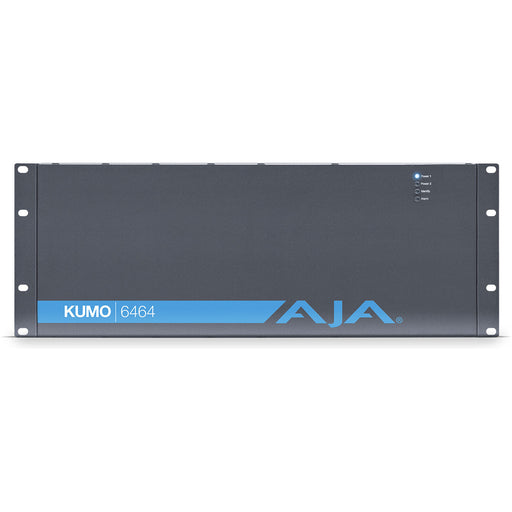 AJA KUMO 6464 compact 64x64 3G-SDI router with full-size BNC connectors, front-panel control buttons, and LCD screen in a 4RU rack-mounted unit.