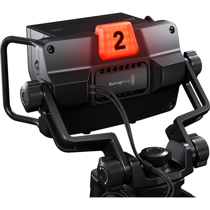 The Blackmagic Design URSA Studio Viewfinder G2 (CINEURSANSVF2) is a 7-inch, 1920x1200 high-brightness monitor for URSA Studio and Mini cameras. It features a detachable sun hood, side handles, SDI input, and customizable controls for professional studio use.