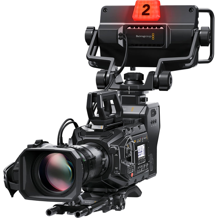 The Blackmagic Design URSA Studio Viewfinder G2 (CINEURSANSVF2) is a 7-inch, 1920x1200 high-brightness monitor for URSA Studio and Mini cameras. It features a detachable sun hood, side handles, SDI input, and customizable controls for professional studio use.