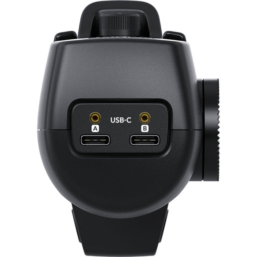 The Blackmagic Design Zoom Demand (CINSTUDMFT/H/FZD) is a control device for Blackmagic Studio 4K Plus and 4K Pro cameras. It offers precise zoom control with an in/out toggle, speed selection, and a record button. Featuring dual USB-C connections and a rosette mount for flexible camera attachment, it enhances ergonomic control during shoots.