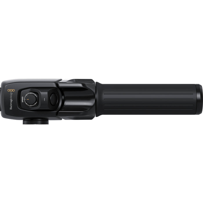 The Blackmagic Design Zoom Demand (CINSTUDMFT/H/FZD) is a control device for Blackmagic Studio 4K Plus and 4K Pro cameras. It offers precise zoom control with an in/out toggle, speed selection, and a record button. Featuring dual USB-C connections and a rosette mount for flexible camera attachment, it enhances ergonomic control during shoots.