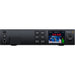The Blackmagic Design Zoom Demand (model CINSTUDMFTHSC) is a control device designed for Blackmagic Studio Cameras. It offers precise zoom control with an in/out toggle and speed selection knob. The device connects via dual USB-C ports and mounts on the camera's pan handle using a rosette, allowing for flexible positioning. It is compatible with Blackmagic Studio Camera 4K Plus and 4K Pro models.