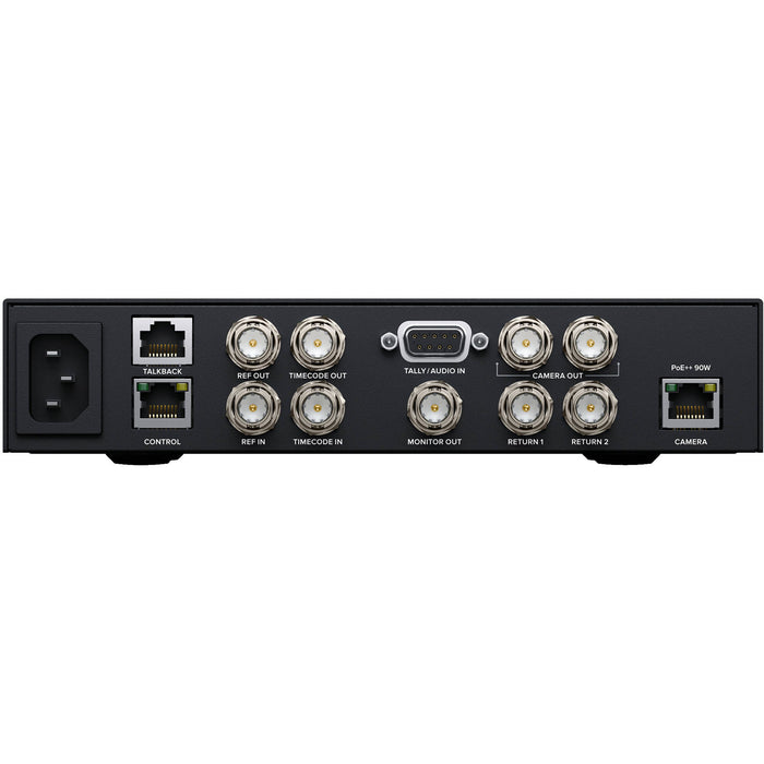 The Blackmagic Design Zoom Demand (model CINSTUDMFTHSC) is a control device designed for Blackmagic Studio Cameras. It offers precise zoom control with an in/out toggle and speed selection knob. The device connects via dual USB-C ports and mounts on the camera's pan handle using a rosette, allowing for flexible positioning. It is compatible with Blackmagic Studio Camera 4K Plus and 4K Pro models.