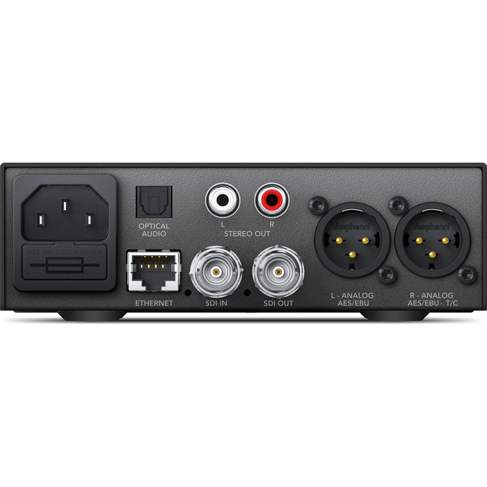 The Blackmagic Design Teranex Mini SDI to Audio 12G Converter is a compact, rectangular device with a matte black finish. The front panel features a USB port and ventilation grilles, while the rear panel includes a 12G-SDI input, a loop-through SDI output, balanced XLR audio outputs, unbalanced RCA audio outputs, an optical audio output, an Ethernet port, and a standard IEC power input. This design facilitates professional audio de-embedding from SDI signals in broadcast and post-production environments.