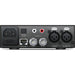The Blackmagic Design Teranex Mini Audio to SDI 12G Converter is a compact, rectangular device with a matte black finish. The front panel features a USB port and ventilation grilles, while the rear panel includes balanced XLR audio inputs, unbalanced RCA audio inputs, an optical audio input, a 12G-SDI output, an Ethernet port, and a standard IEC power input. This design facilitates professional audio embedding into SDI signals in broadcast and post-production environments.