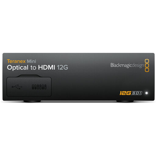 The Blackmagic Design Teranex Mini Optical to HDMI 12G Converter is a compact, rectangular device with a matte black finish. The front panel features a USB port and ventilation grilles, while the rear panel includes a 12G-SDI input, an optional optical fiber input, an HDMI output, two full-size XLR audio outputs, an Ethernet port, and a standard IEC power input. This design facilitates the conversion of high-resolution SDI or optical fiber signals to HDMI, supporting video formats up to DCI 4K at 60p.