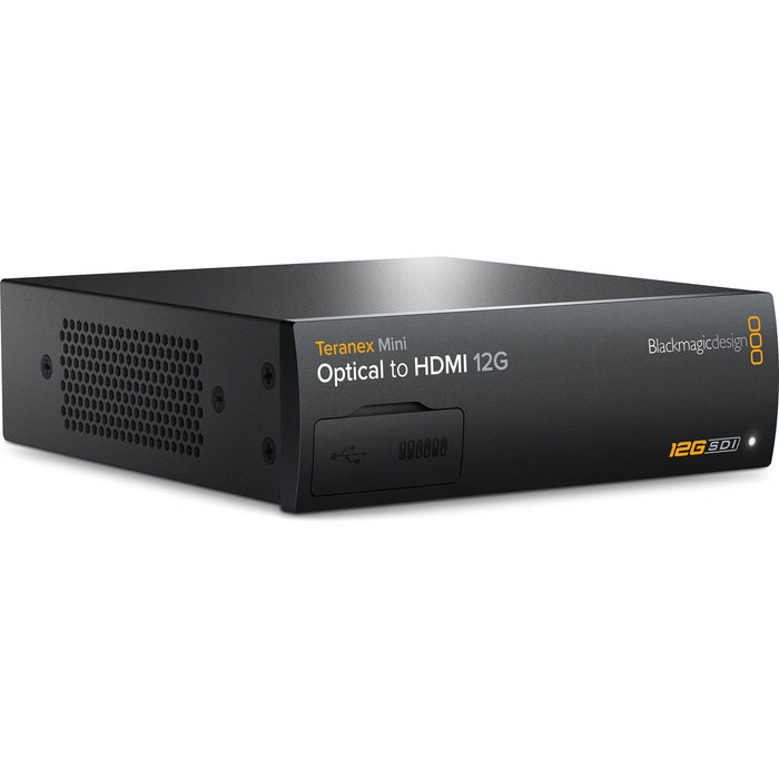 The Blackmagic Design Teranex Mini Optical to HDMI 12G Converter is a compact, rectangular device with a matte black finish. The front panel features a USB port and ventilation grilles, while the rear panel includes a 12G-SDI input, an optional optical fiber input, an HDMI output, two full-size XLR audio outputs, an Ethernet port, and a standard IEC power input. This design facilitates the conversion of high-resolution SDI or optical fiber signals to HDMI, supporting video formats up to DCI 4K at 60p.