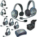 Eartec HUB835 wireless intercom system with 3 single-ear and 5 dual-ear headsets, compact HUB base, multi-port charger, and carry case.