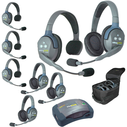 Eartec HUB844 wireless intercom system with 4 single-ear and 4 dual-ear headsets, compact HUB base, multi-port charger, and carry case.