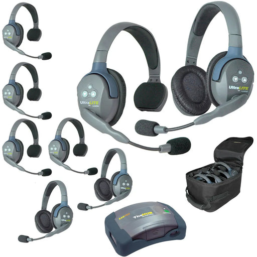Eartec HUB853 wireless intercom system with 5 single-ear and 3 dual-ear headsets, compact HUB base, multi-port charger, and carry case.