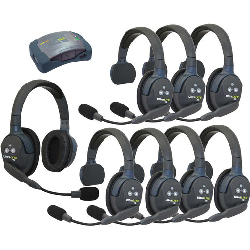 Eartec HUB871 wireless intercom system with 7 single-ear and 1 dual-ear headsets, compact HUB base, charger, and carry case.