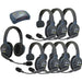 Eartec HUB871 wireless intercom system with 7 single-ear and 1 dual-ear headsets, compact HUB base, charger, and carry case.