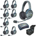 Eight-person Eartec HUB8D wireless intercom system with dual-ear headsets, portable HUB base station, and multi-port charger in a carrying case.