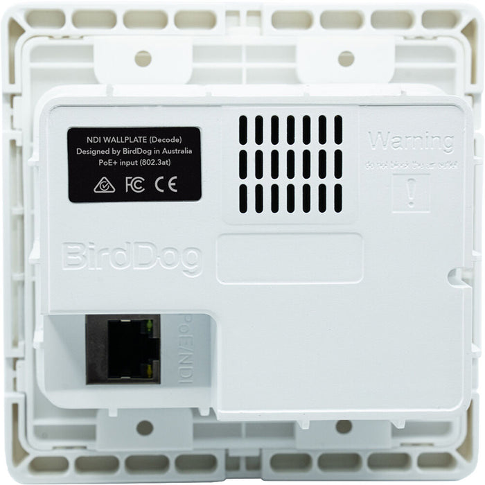 BirdDog BDWPIN Dual Input HDMI to NDI Wallplate installed in a conference room setting
